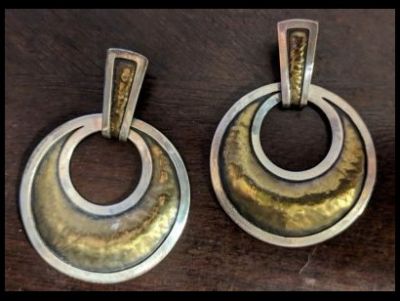 Earrings by jewelry designer James Avery