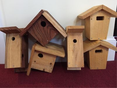 A Collection of 3 Smaller Bird Houses