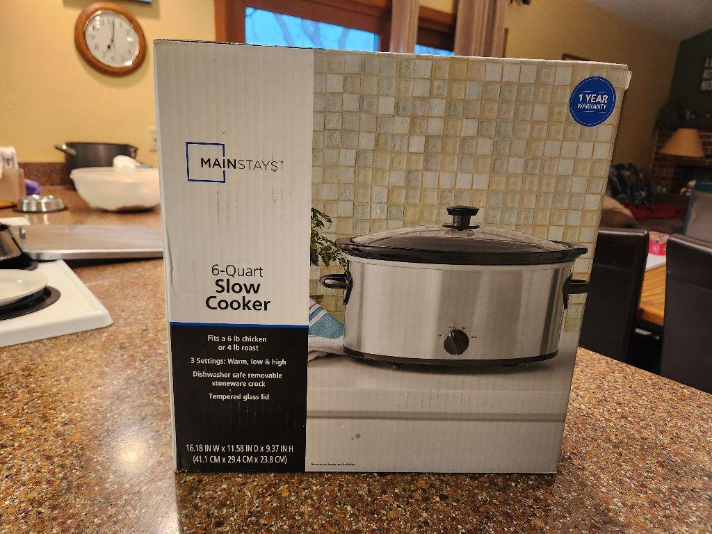 6 Quart Slow Cooker with basket of food.