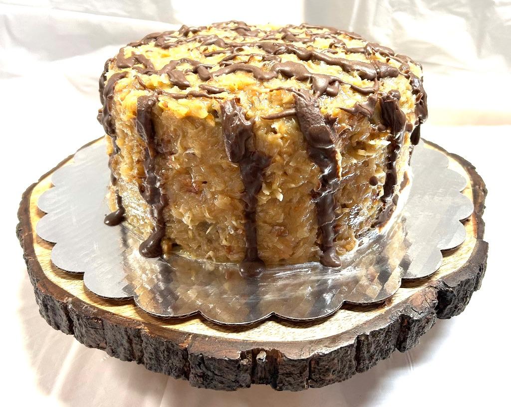 Homemade German Chocolate Cake on Wooden Cake Stand