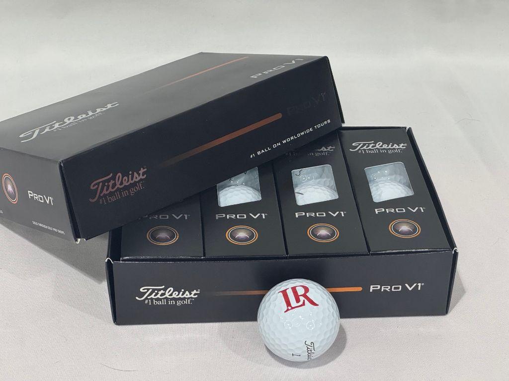 Box of Lenoir-Rhyne Branded Titleist Golf Balls