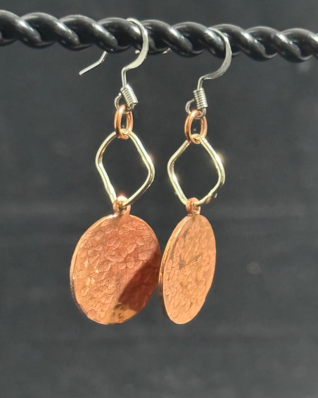 Copper earrings by Faith Cleveland