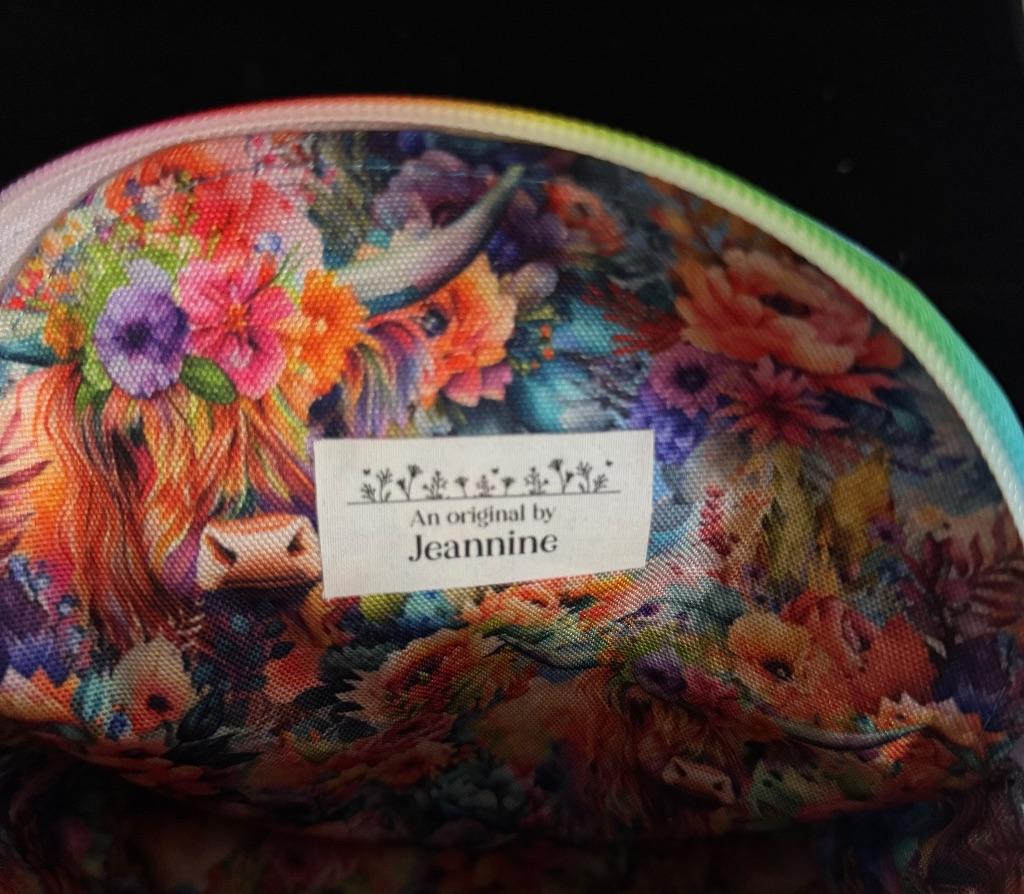 Cow Print Mini Backpack by Jeannine Lancaster