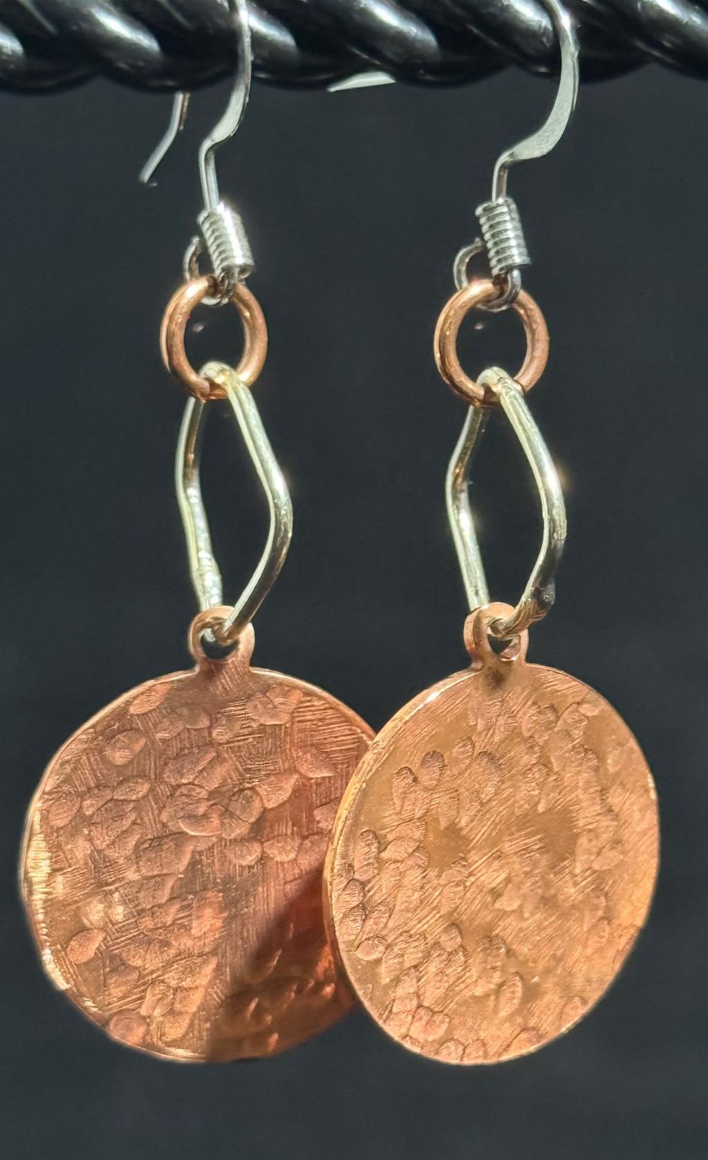 Copper earrings by Faith Cleveland