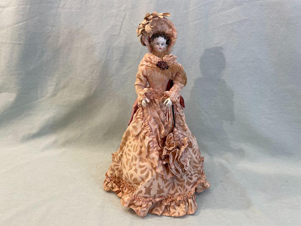 Doll in Pink Dress and Hat