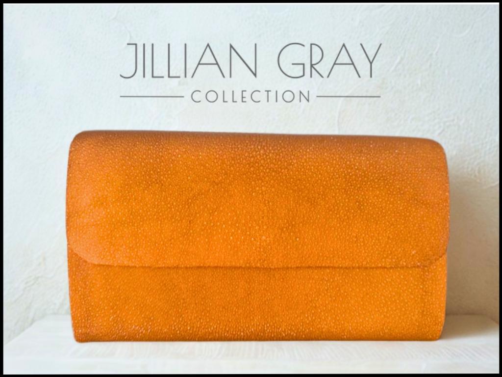 Brick Orange Caviar Stingray Clutch from The Jillian...