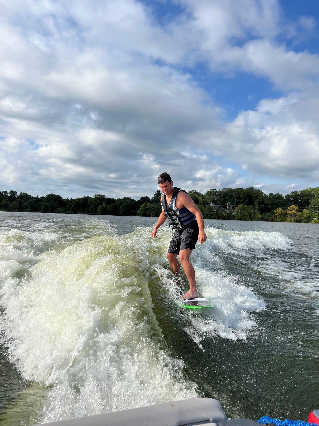 Wake Surfing with Father Paul on Long Lake