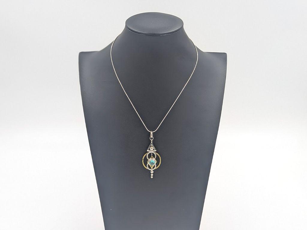 ''Geometric Turquoise Necklace'' by Dee Caiazza
