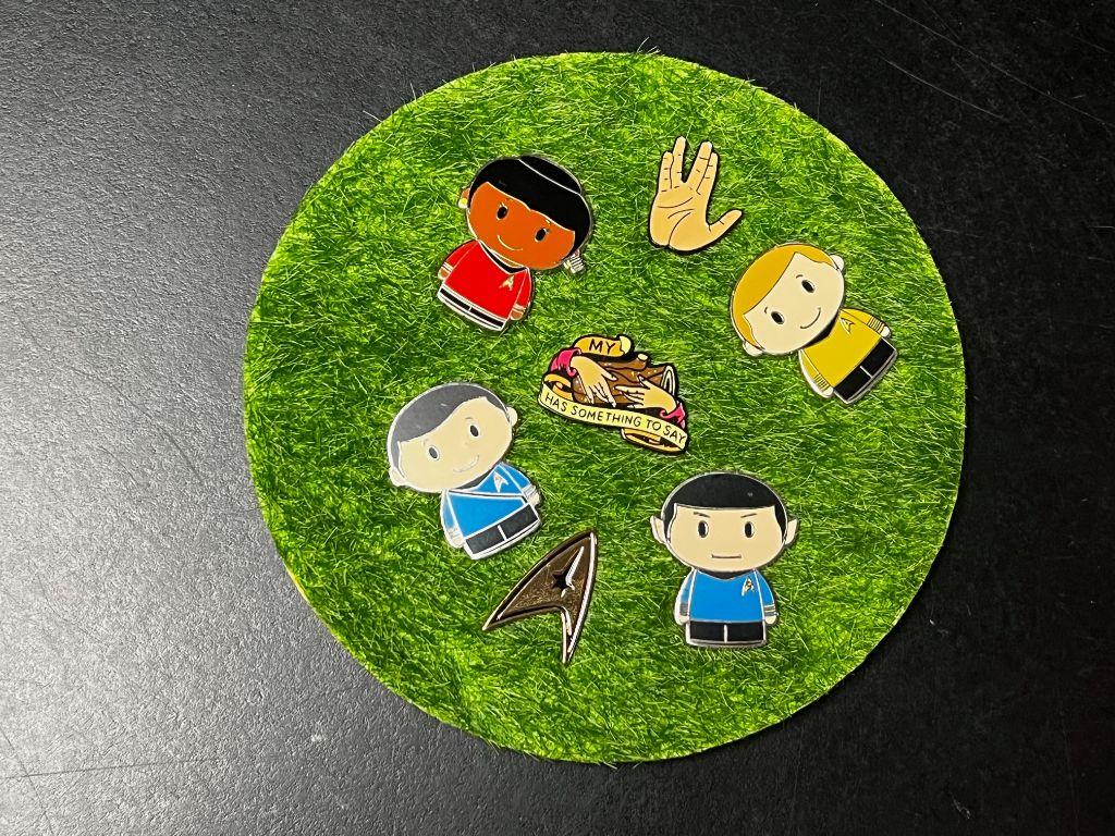 A collection of 6 Star Trek pins autographed by Will...
