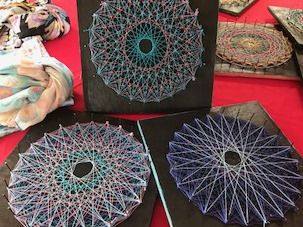 Handmade Tryptic Geometric String Art by Sixth Grade: Blues