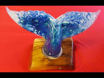 Blown glass whale tail with monkeypod LED light base