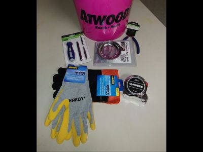 Pink Atwoods bucket with various items