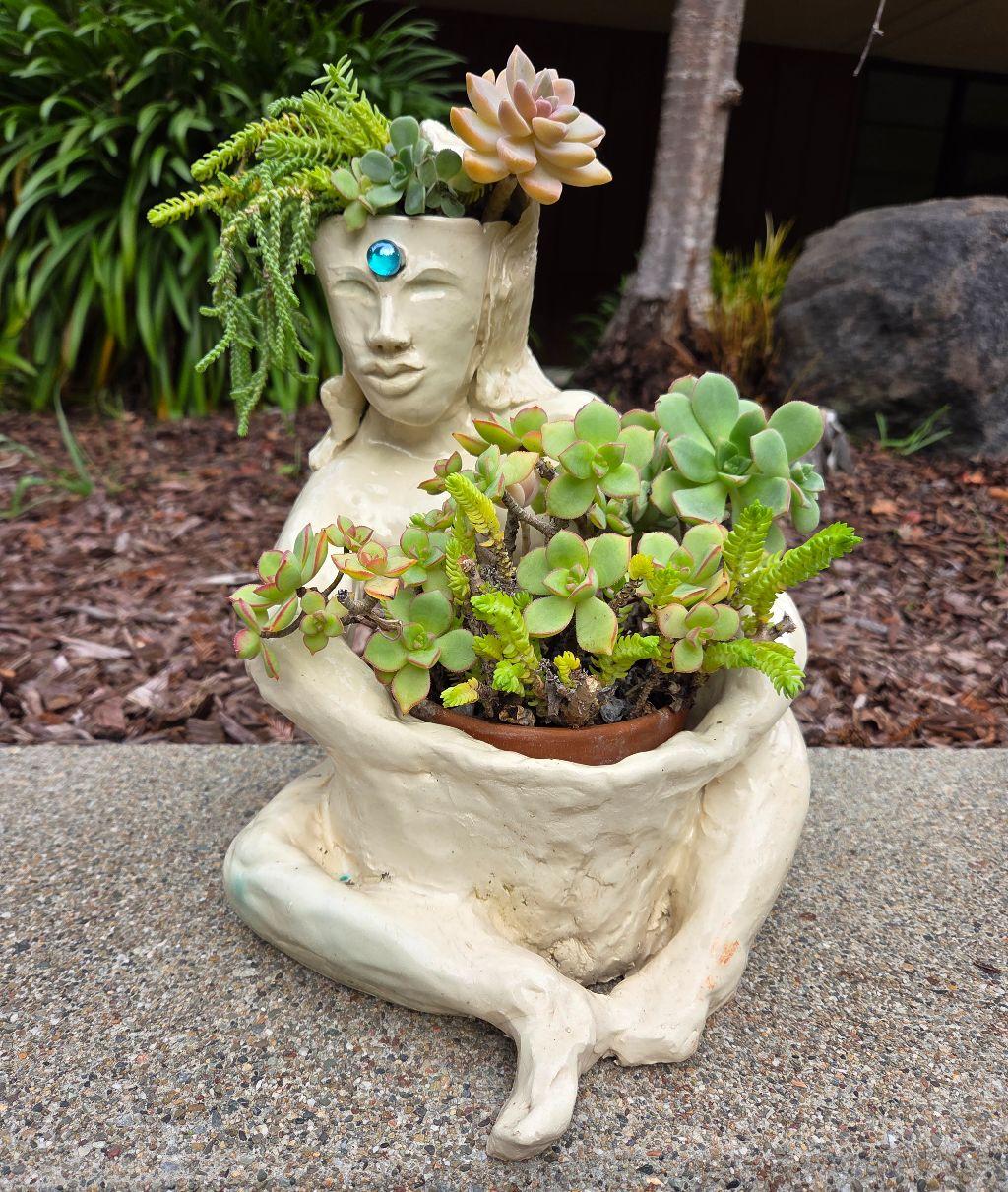 Figure Holding Garden Basket by Jane Vanderveer