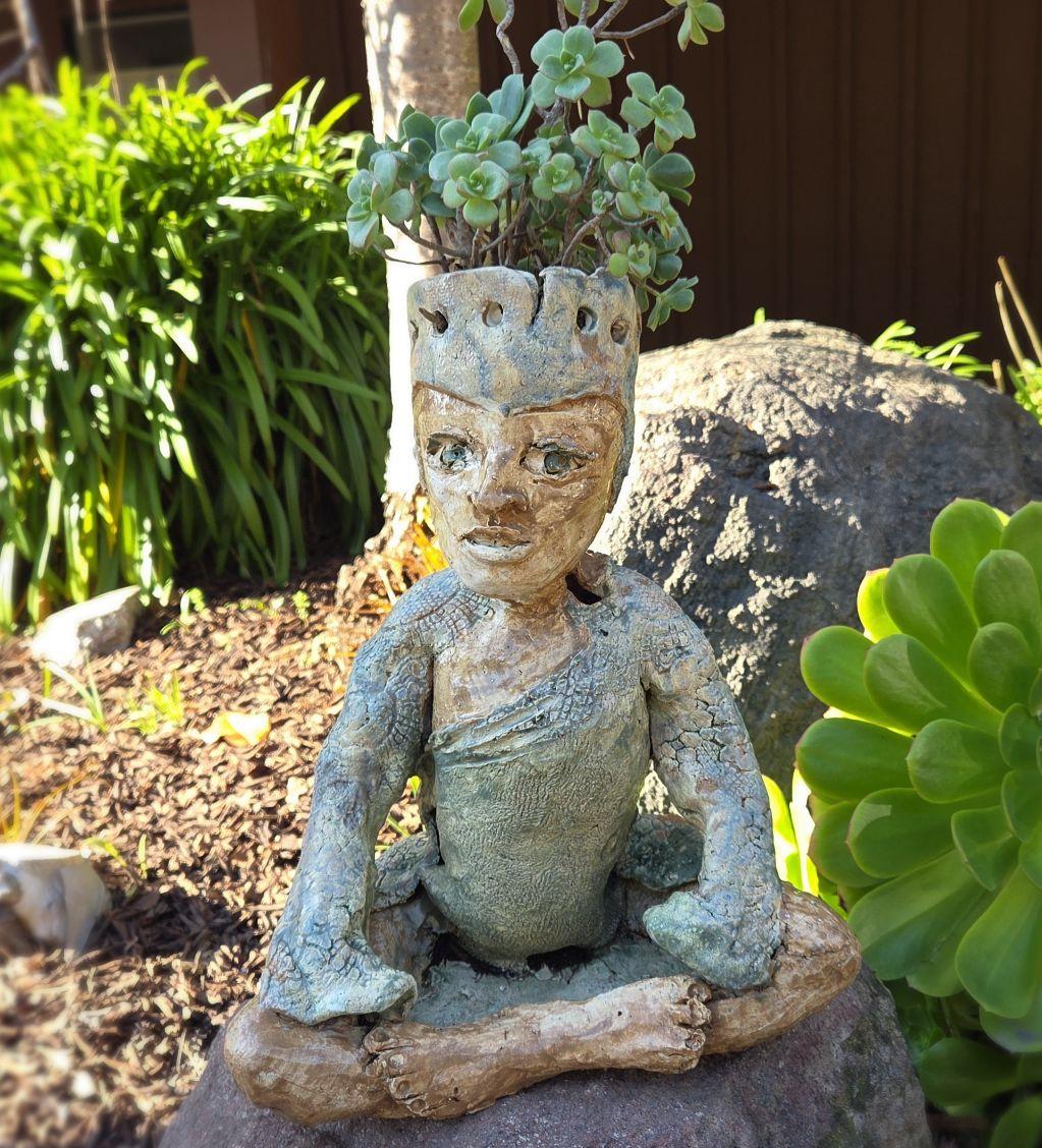 Seated Man with Succulent Headdress by Jane Vanderve...