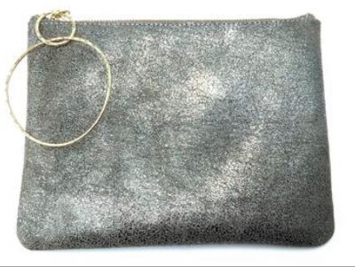 Medium Cosmo pouch in Distressed Metallic Silver with a hand hammered bangle by Rebecca Norman